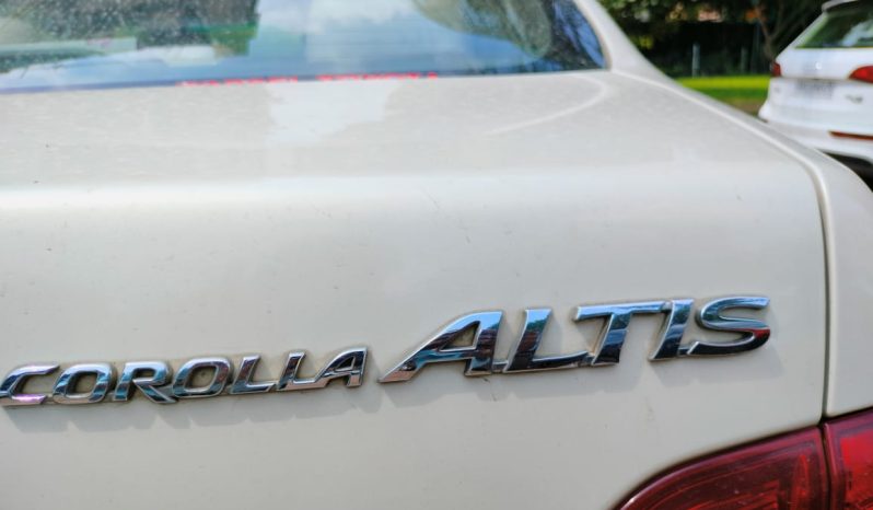 Toyota Corolla Altis white (pet)2010 full